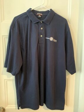 Antigua Men's Navy polo Shirt - Classicwith cleveland tramrail logo